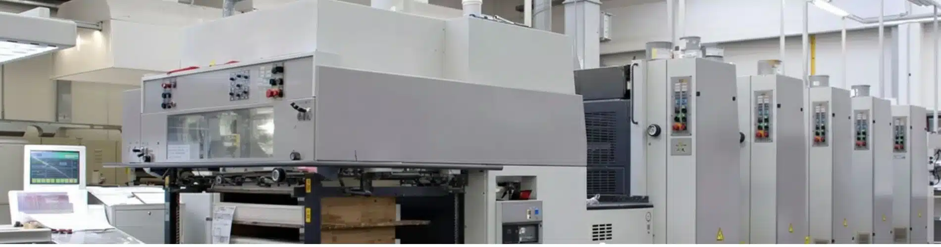 Shiron Prints team workspace showcasing premium printing materials and a professional environment for the About Us section.